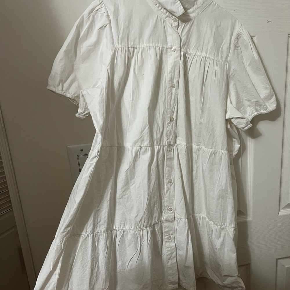White colored flowy button down dress